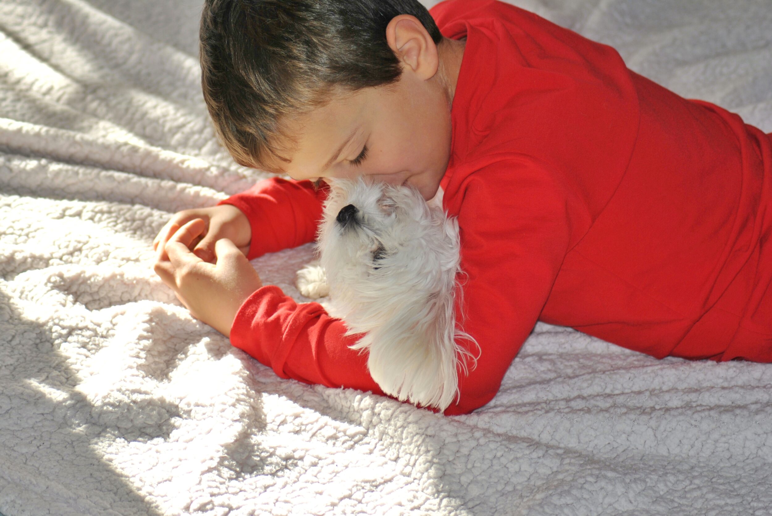 high-angle-view-boy-sleeping-bed-home